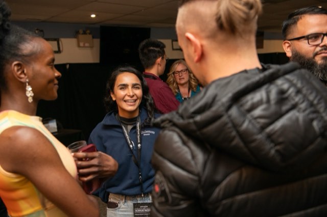 Kimia Nora laughing with fellow attendees at the Future Proof Creator Summit 2026