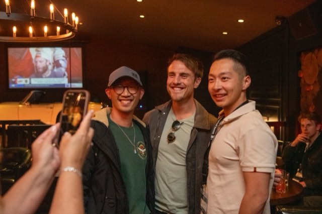 Three attendees posing for a photo at the Future Proof Creator Summit 2026