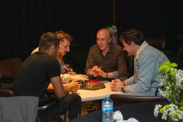 Attendees playing chess late into the evening at the Future Proof Creator Summit 2026