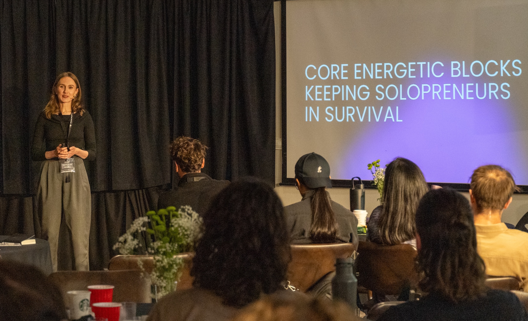 A speaker presenting a workshop at the 2026 summit